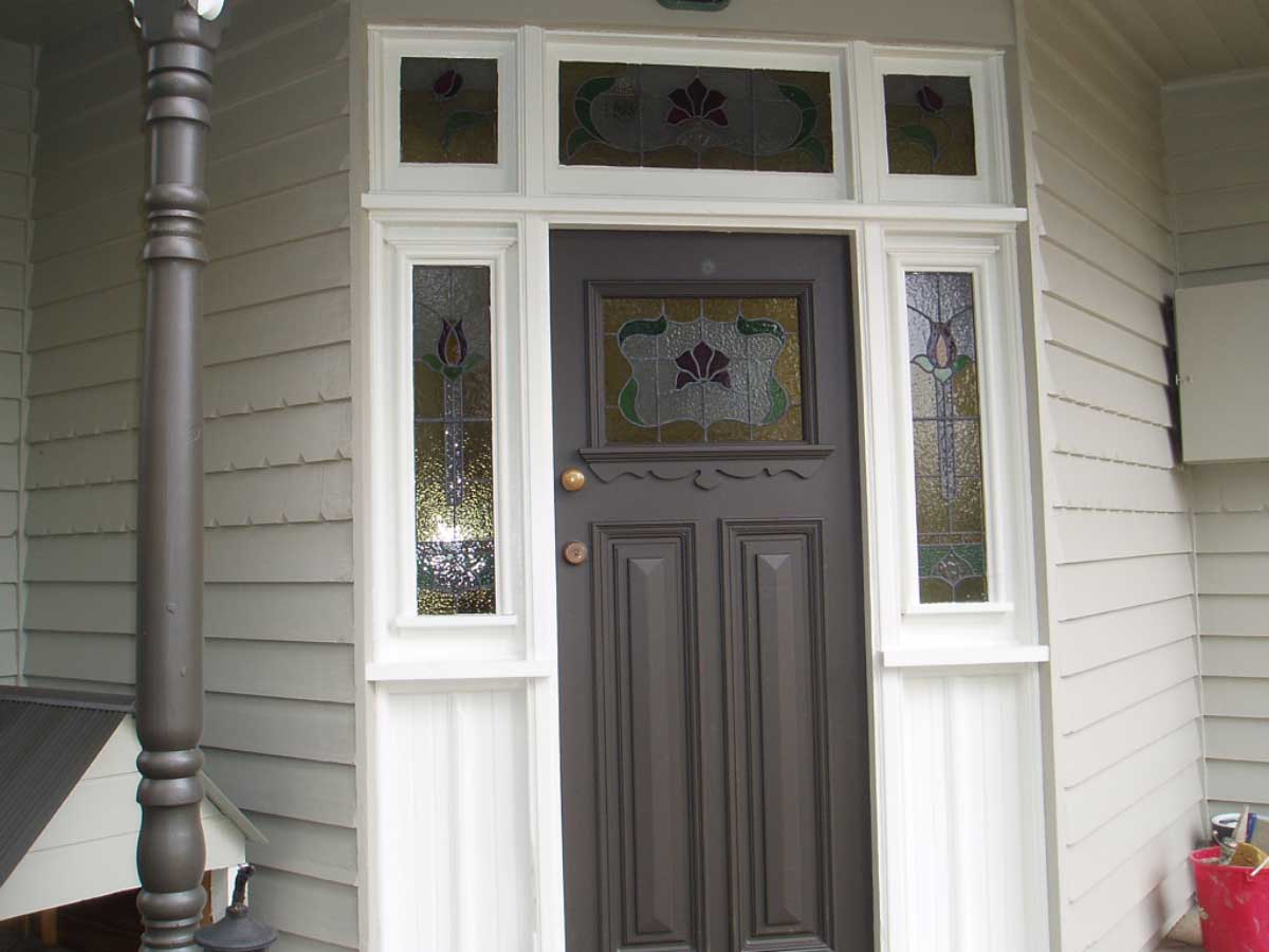 Repainted heritage front door in grey with stained glass panels